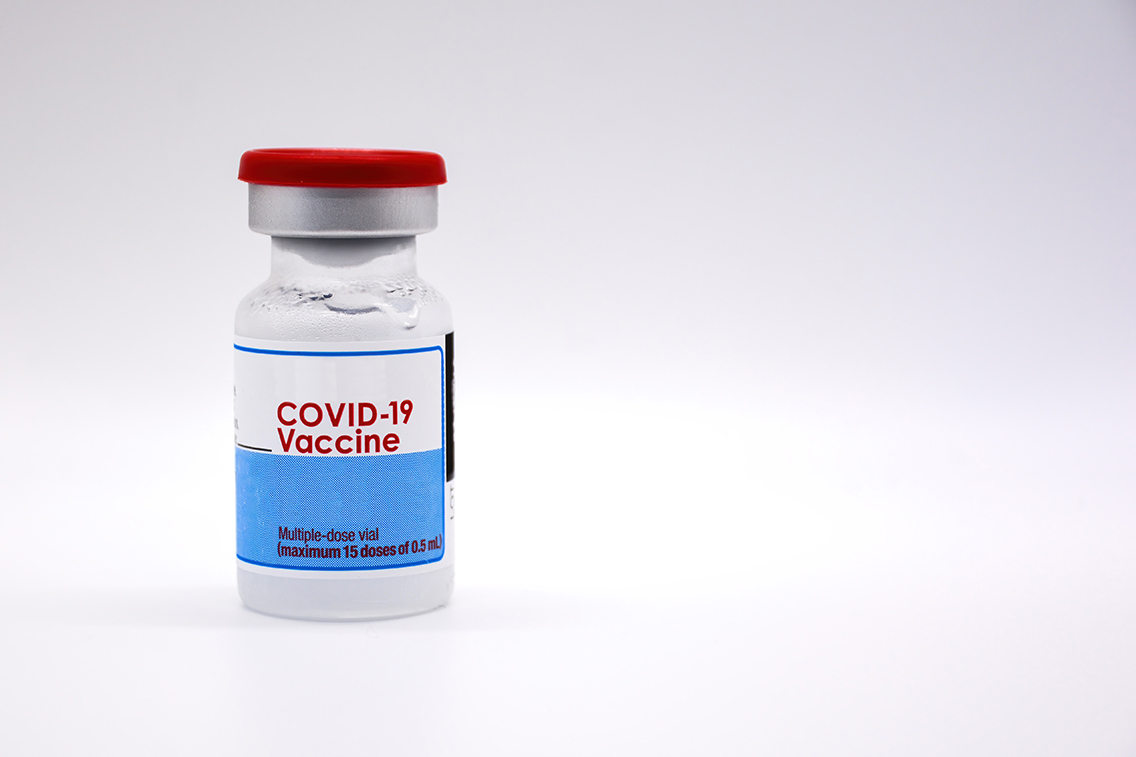 Close-up of a COVID-19 vaccine vial.